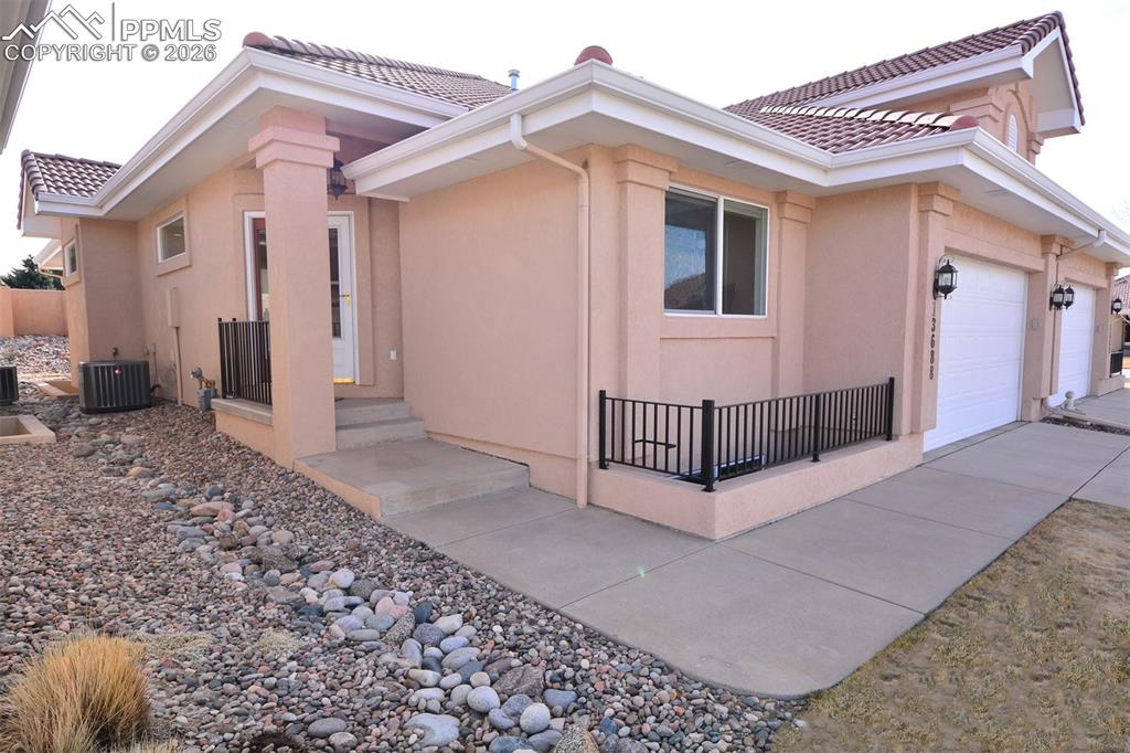 Image 2 of 50: Covered front porch/entry