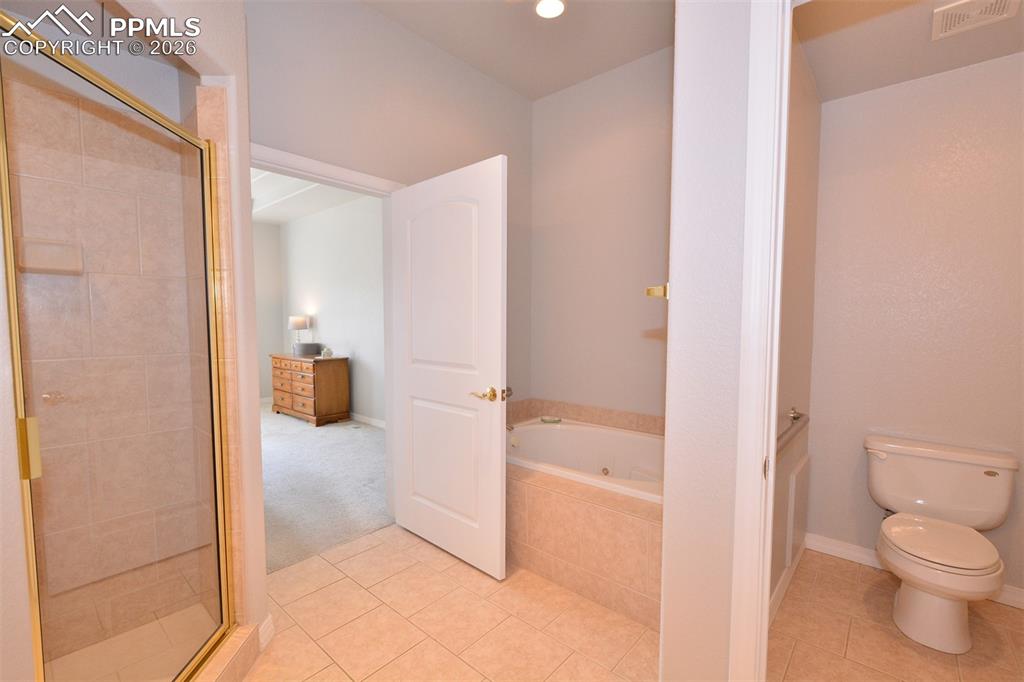 Image 22 of 50: Primary 5-piece bathroom