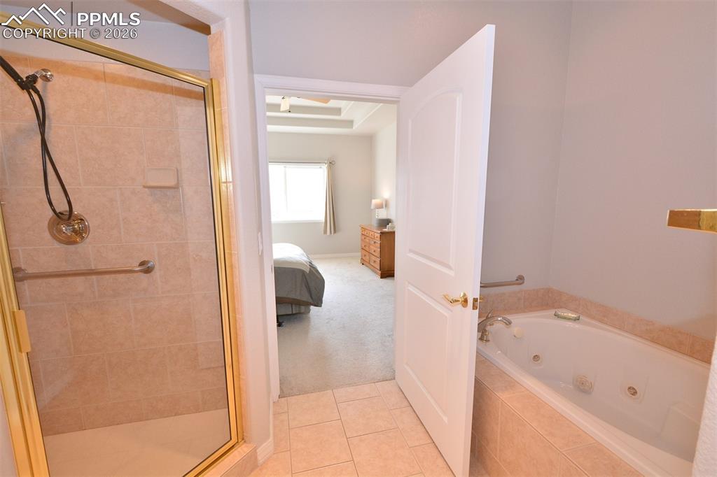 Image 23 of 50: 2nd view of primary 5-piece bathroom