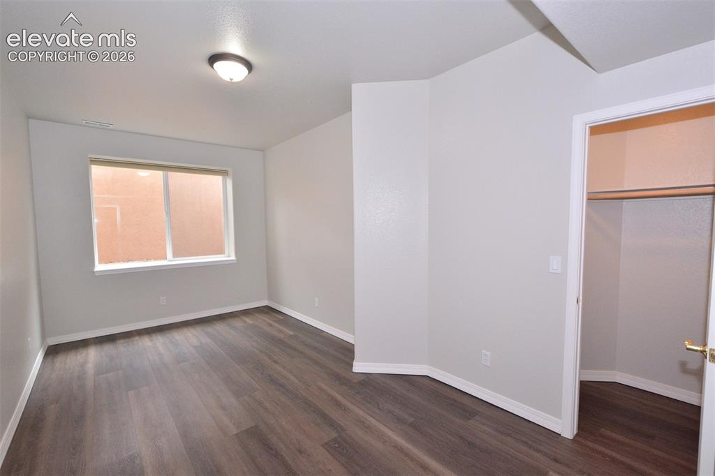 Image 23 of 33: basement bedroom