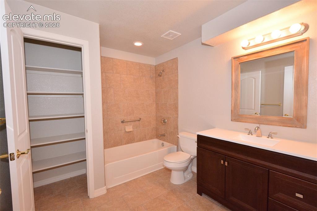 Image 25 of 33: basement bathroom
