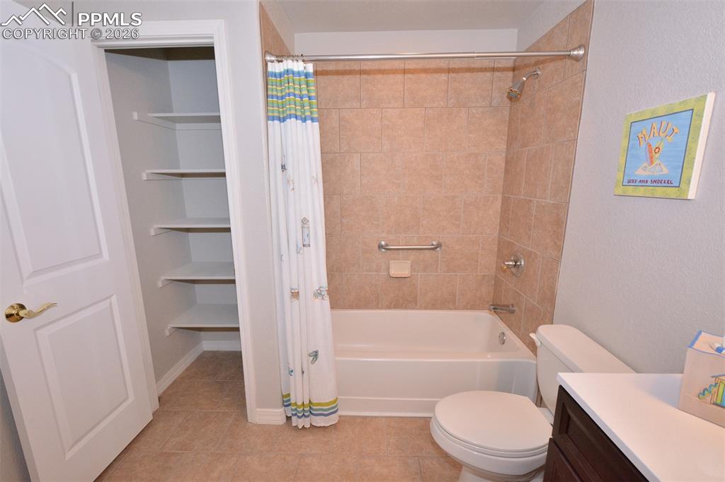 Image 30 of 50: Ful bathroom in basement