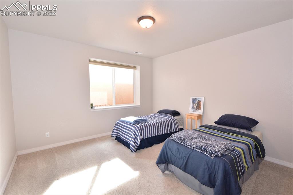 Image 31 of 50: 3rd bedroom in basement