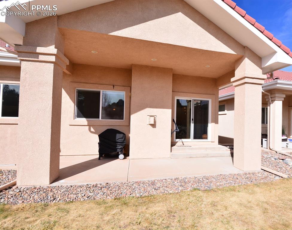 Image 33 of 50: Back of home-Covered Patio