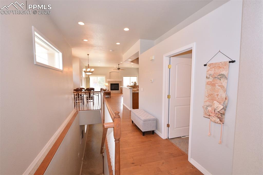 Image 8 of 50: Main level hallway from entry