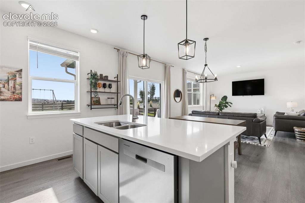 Image 10 of 47: Modern updated lighting fixtures
