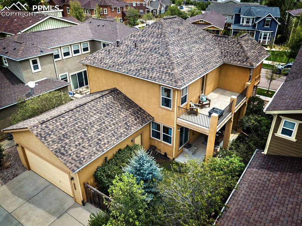 Image 3 of 33: Aerial view captures the upper level deck off the primary suite along with 