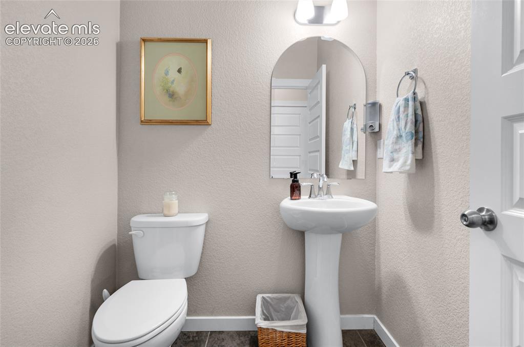 Image 16 of 47: Main level bathroom