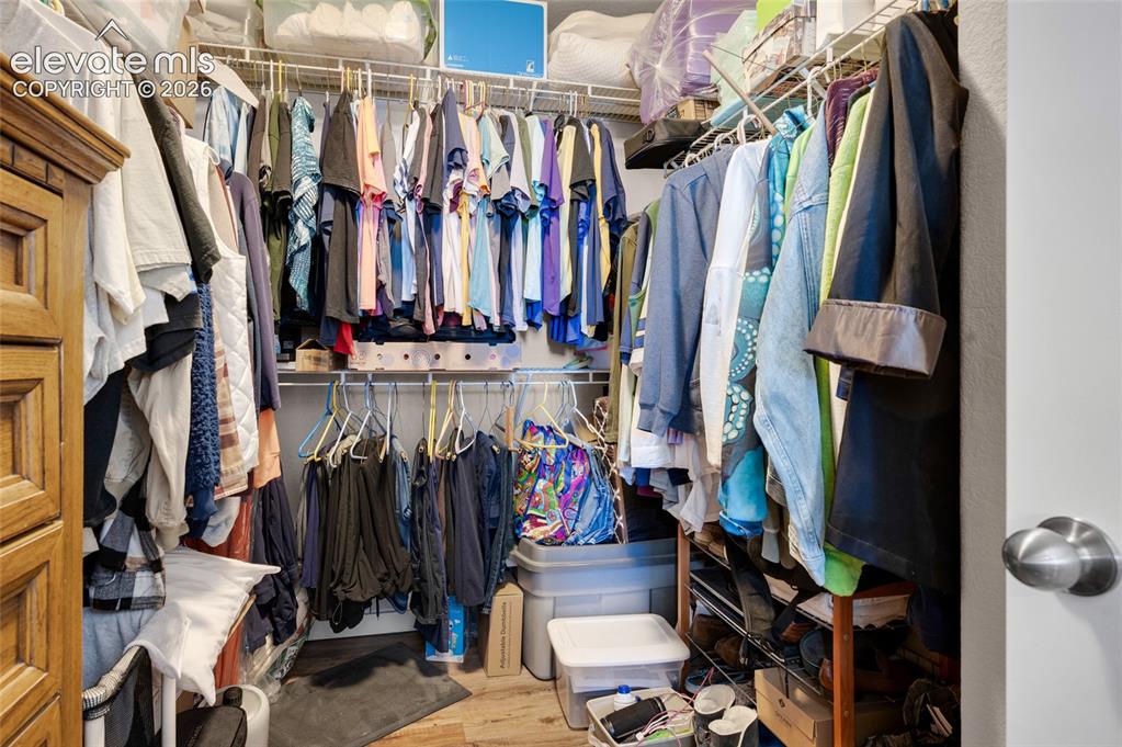 Image 23 of 47: Roomy walk-in closet