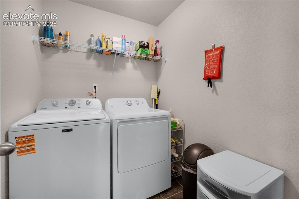 Image 26 of 47: Laundry is conveniently located near upstairs bedrooms