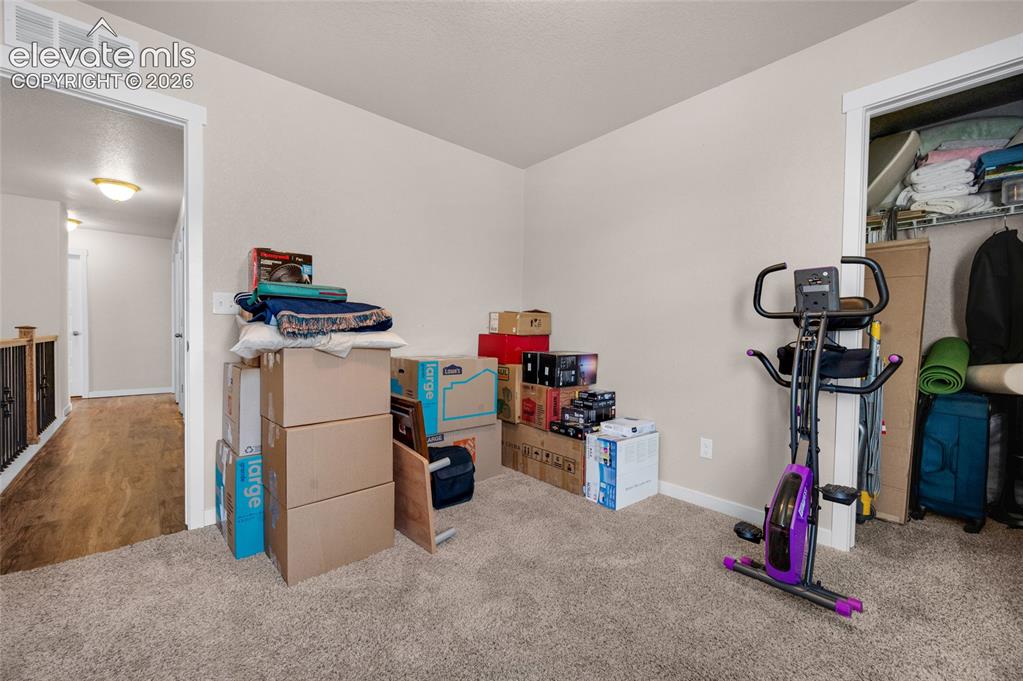 Image 30 of 47: 4th carpeted bedroom w/walk-in closet