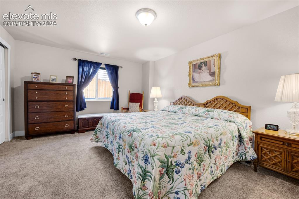 Image 38 of 47: 5th large carpeted bedroom