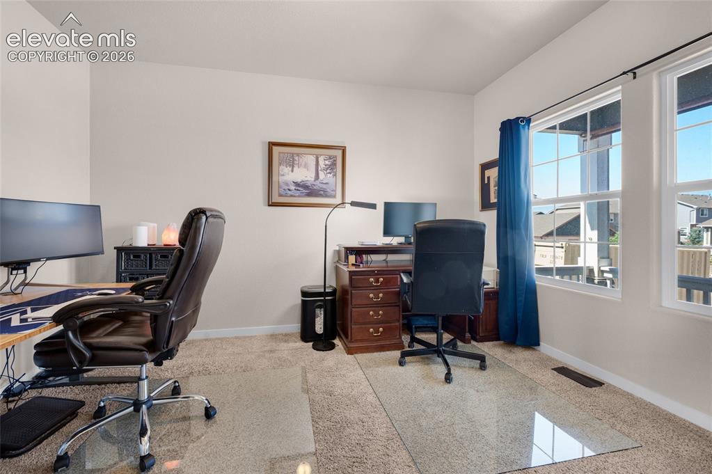 Image 4 of 47: Carpeted main level office