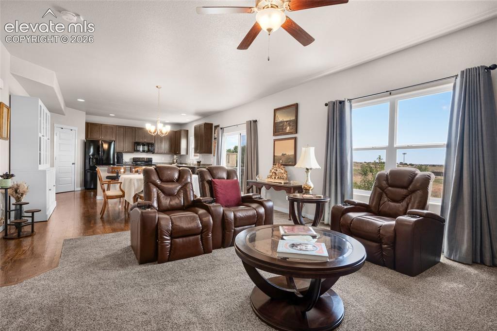 Image 7 of 47: Living Room can look way down to kitchen