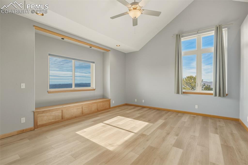 Image 23 of 50: Spare room with light wood-style flooring, healthy amount of natural light,