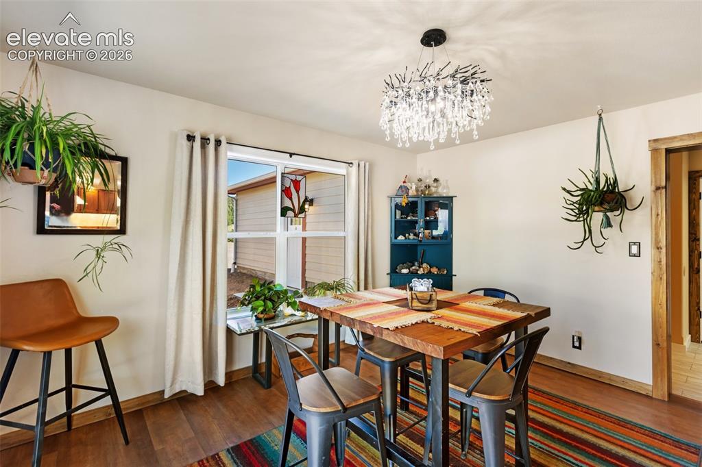 Image 16 of 50: Custom lighting fixtures throughout the home. 