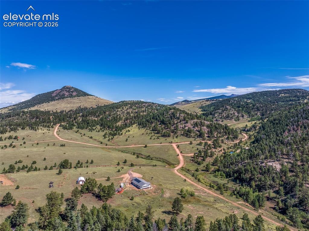 Image 7 of 50: Big Colorado Blue Sky Mountain Setting. 