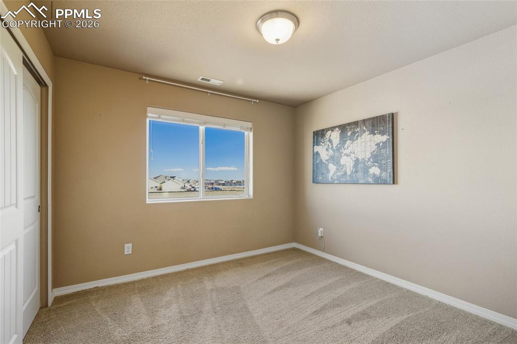 Image 11 of 28: Bedroom