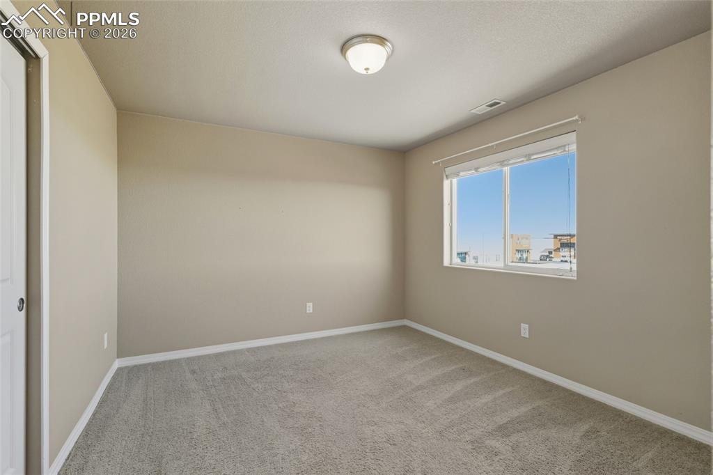 Image 14 of 28: Bedroom