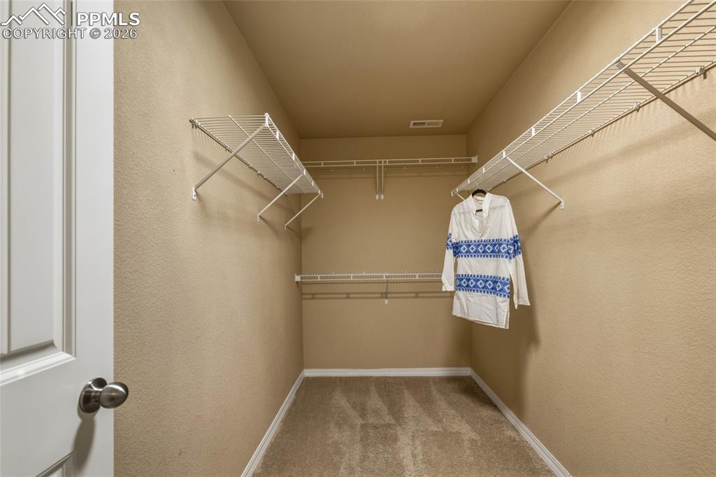 Image 20 of 28: Walk-In Closets