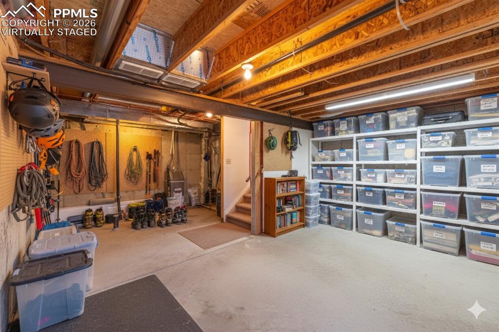 Image 22 of 35: virtually staged basement