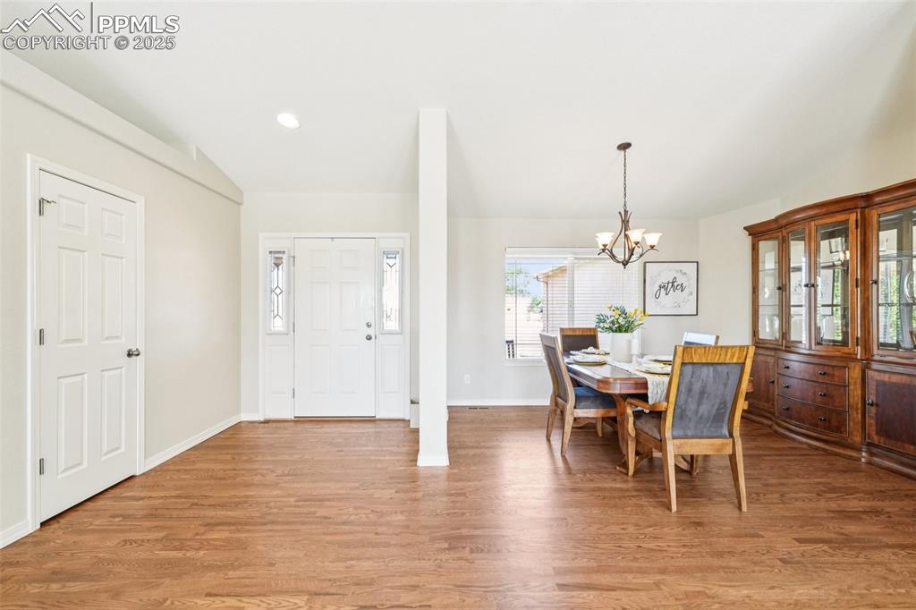 Image 3 of 45: Enter this stunning home to gorgeous hardwood floors and an open concept li
