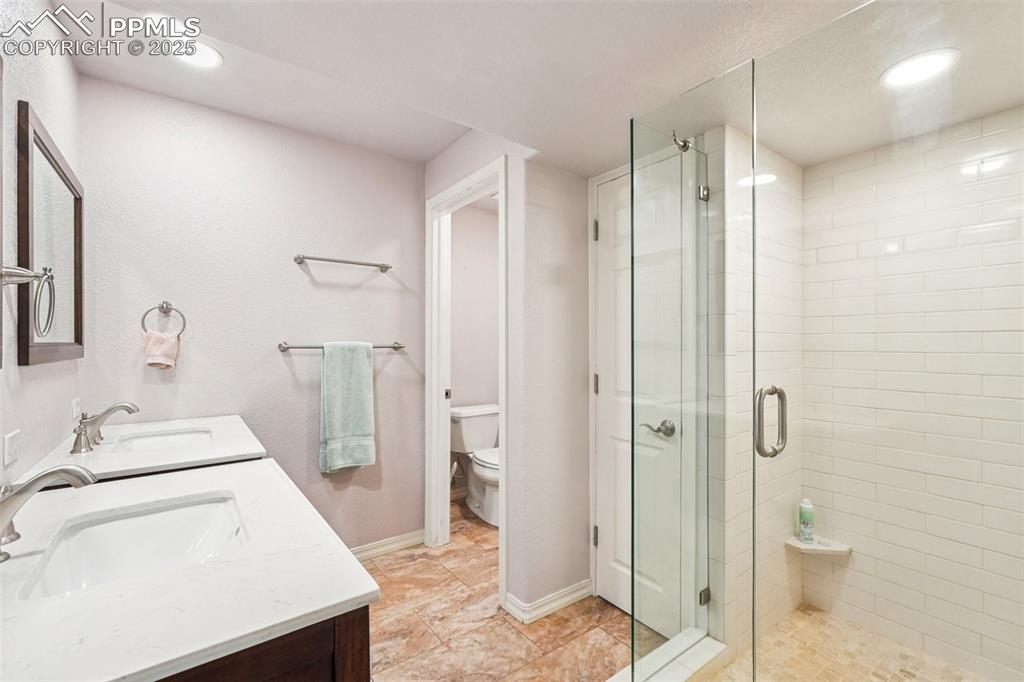 Image 43 of 45: Basement bath.