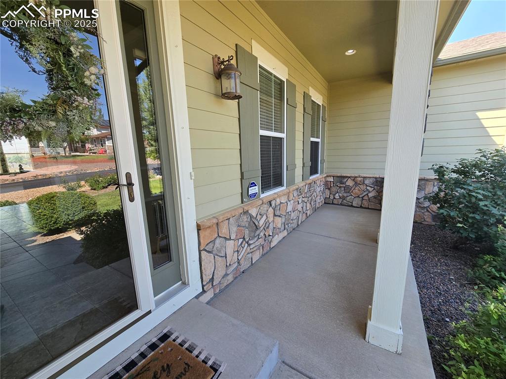 Image 26 of 27: Covered Porch