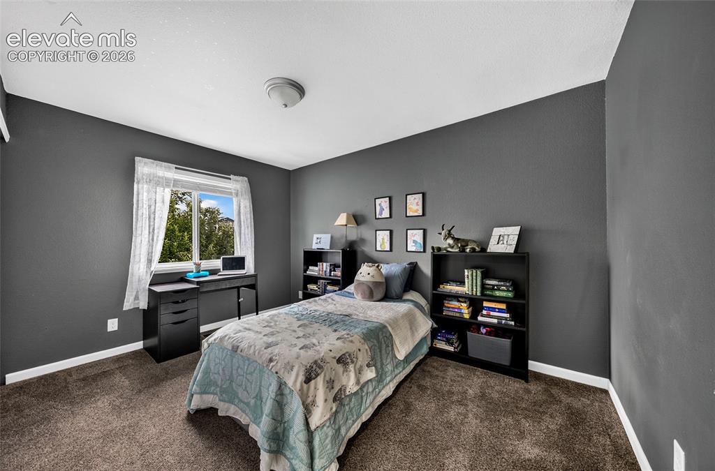 Image 33 of 38: Bedroom