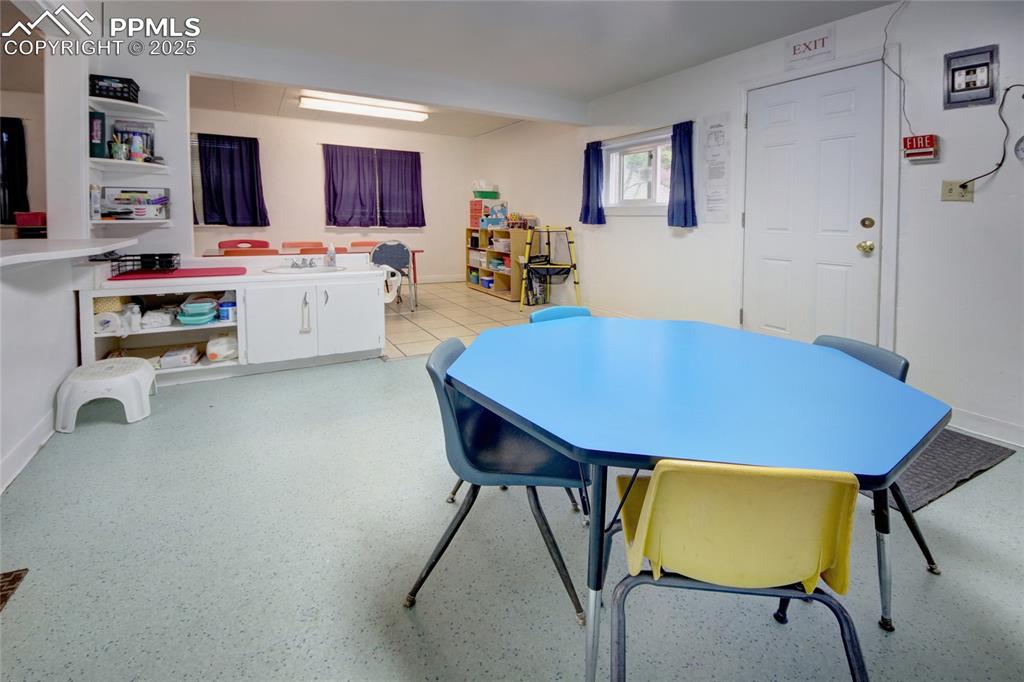 Image 19 of 34: Rec room with baseboards