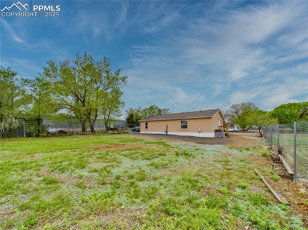Image 43 of 44: Generous backyard space offering endless possibilities