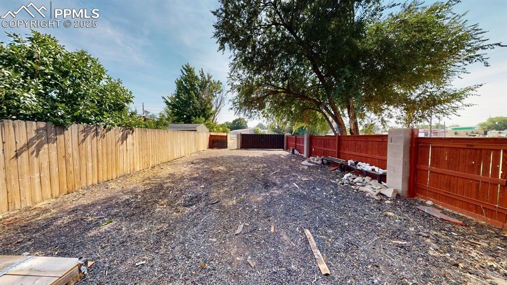 Image 4 of 4: View of fenced yard