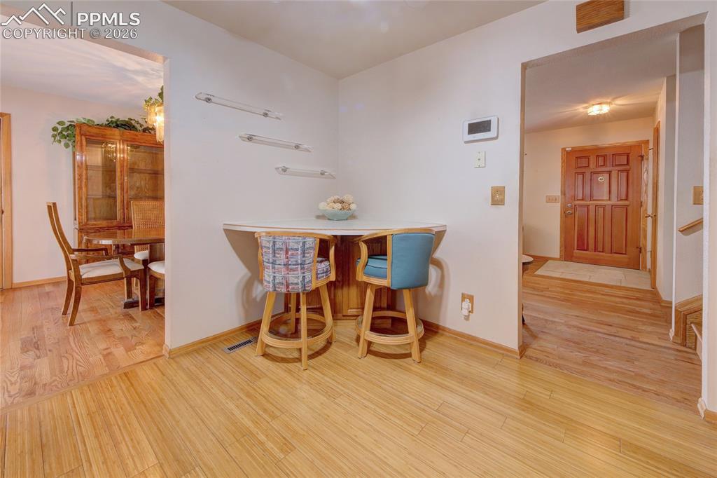 Image 16 of 33: Wood-finish flooring throughout