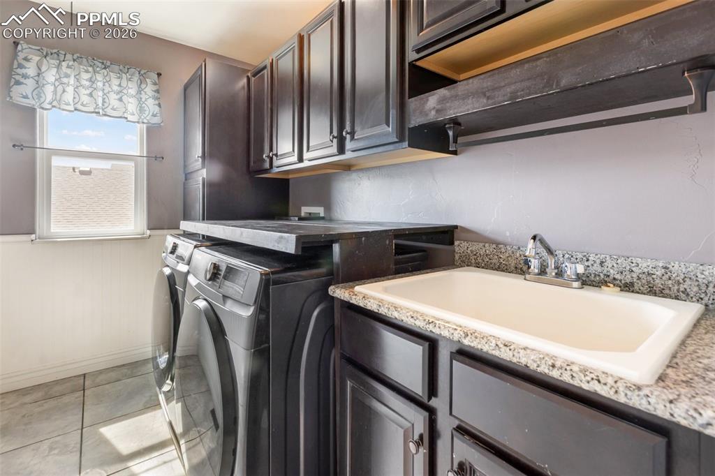 Image 23 of 45: Conveniently located laundry on the upstairs level