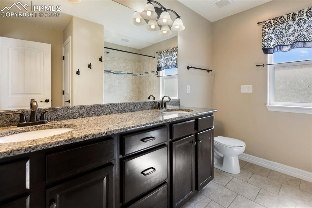 Image 24 of 45: Modern bathroom on the upper level