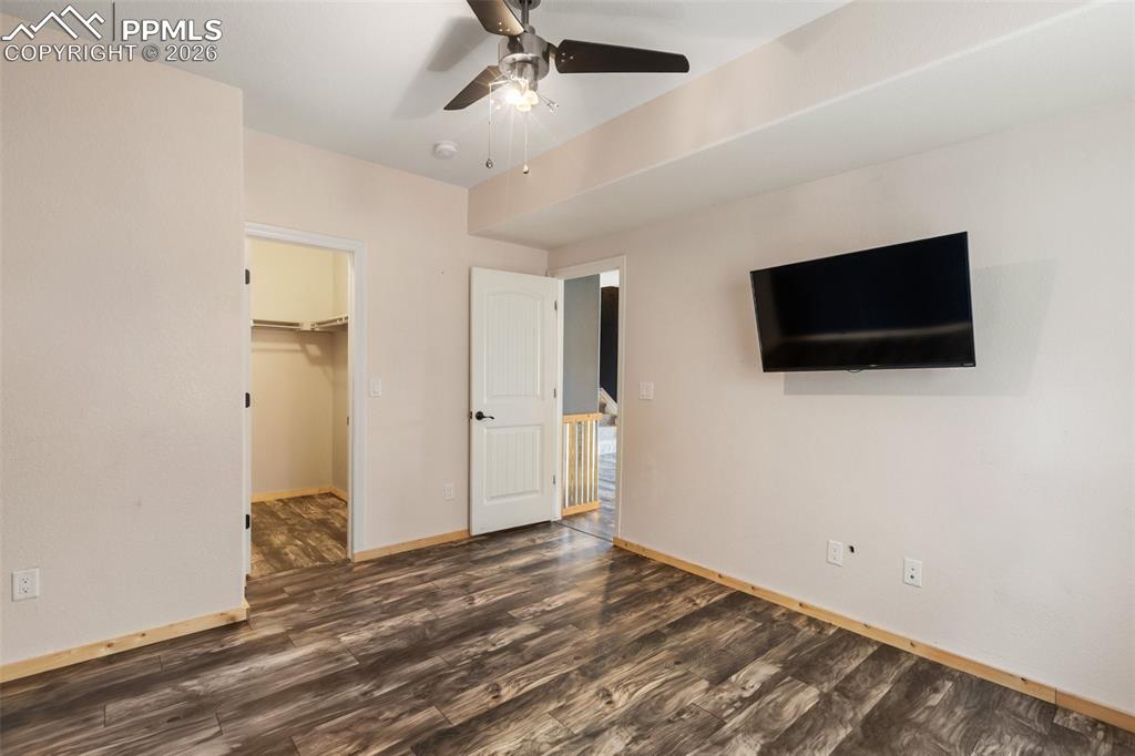 Image 33 of 45: Comfortable bedroom with a functional layout