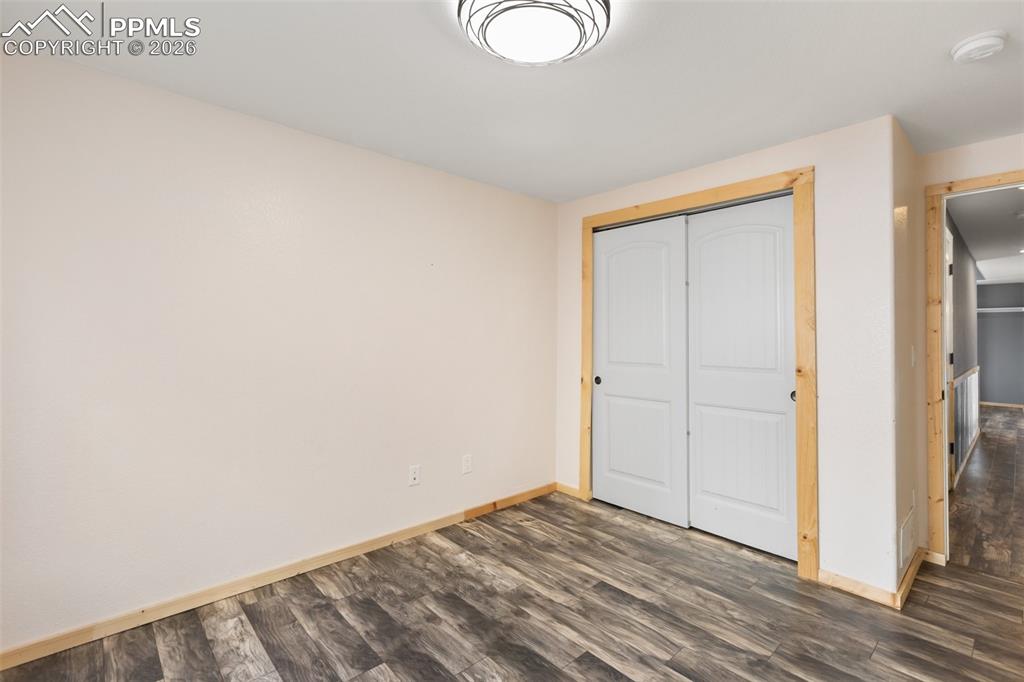 Image 34 of 45: Versatile bedroom ideal for guest, office, or hobbies