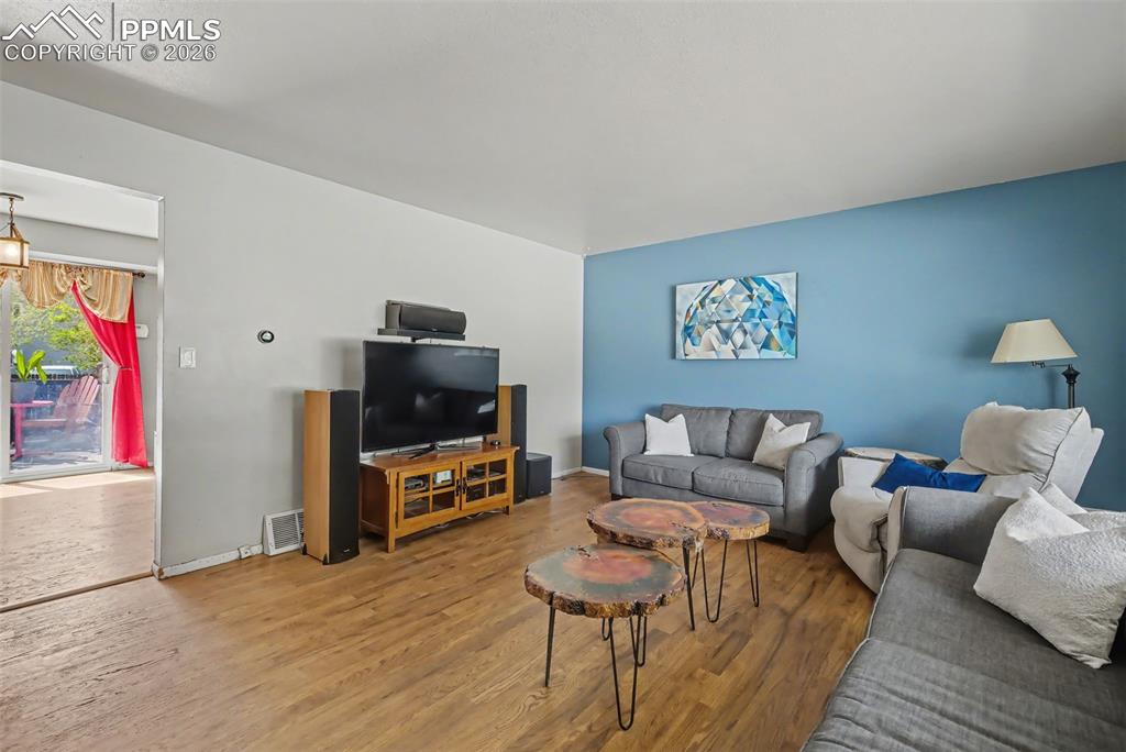 Image 4 of 37: Welcoming living room
