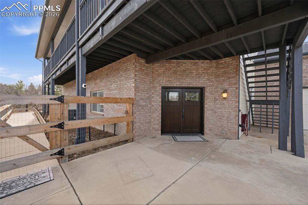 Image 27 of 50: Outside entry to the lower level