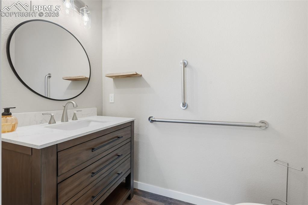 Image 37 of 50: half bath off Bedroom #4