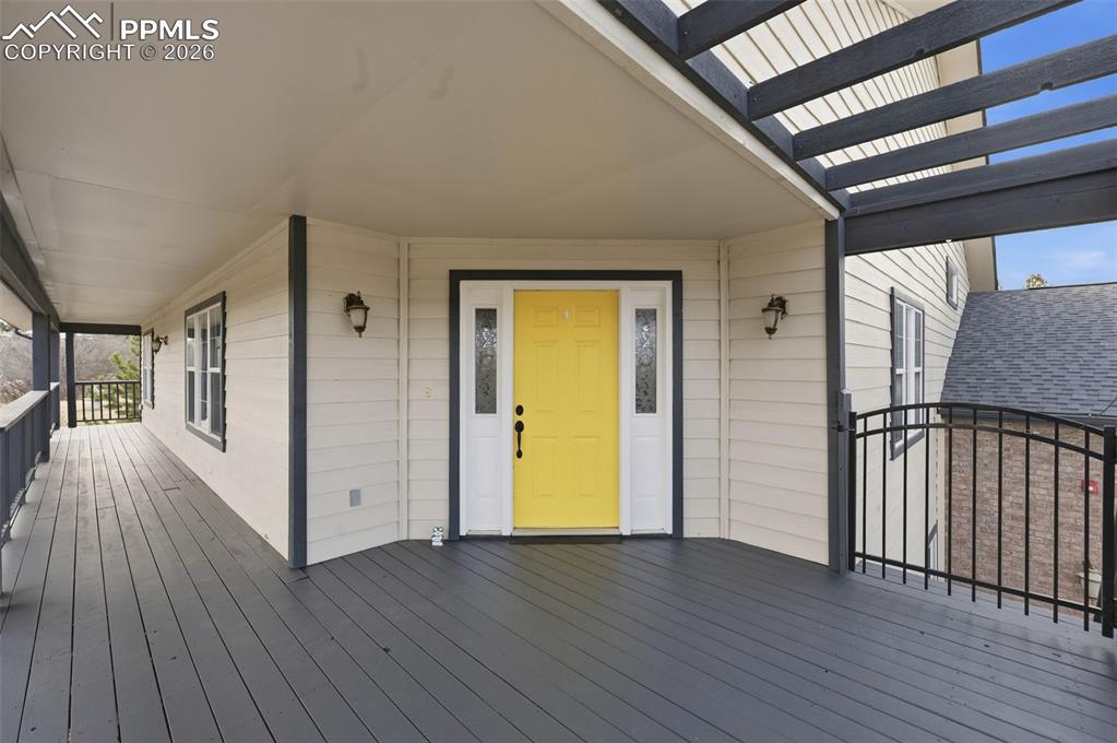 Image 4 of 50: Covered Front door entry