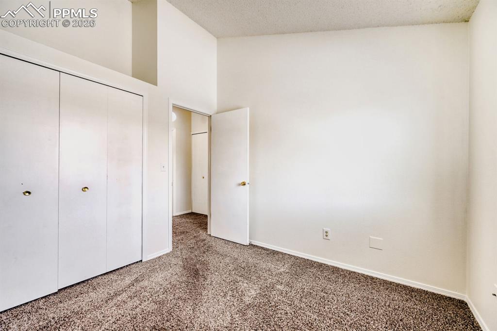 Image 18 of 26: Bedroom