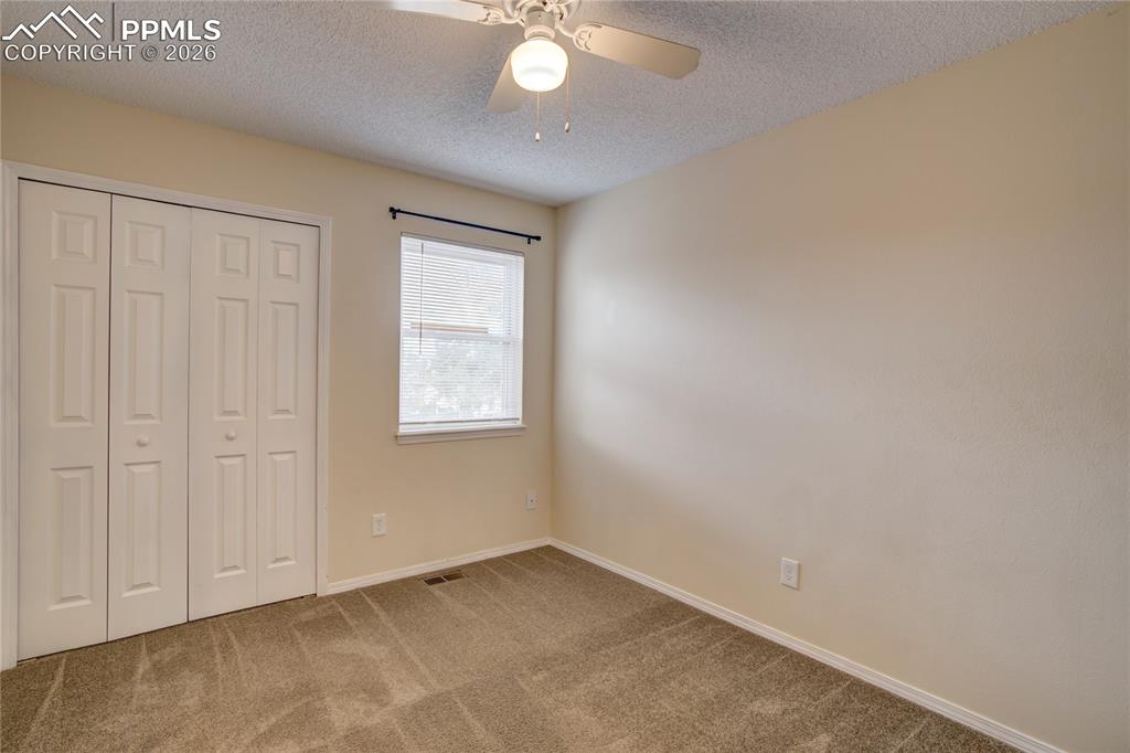 Image 19 of 28: Bedroom