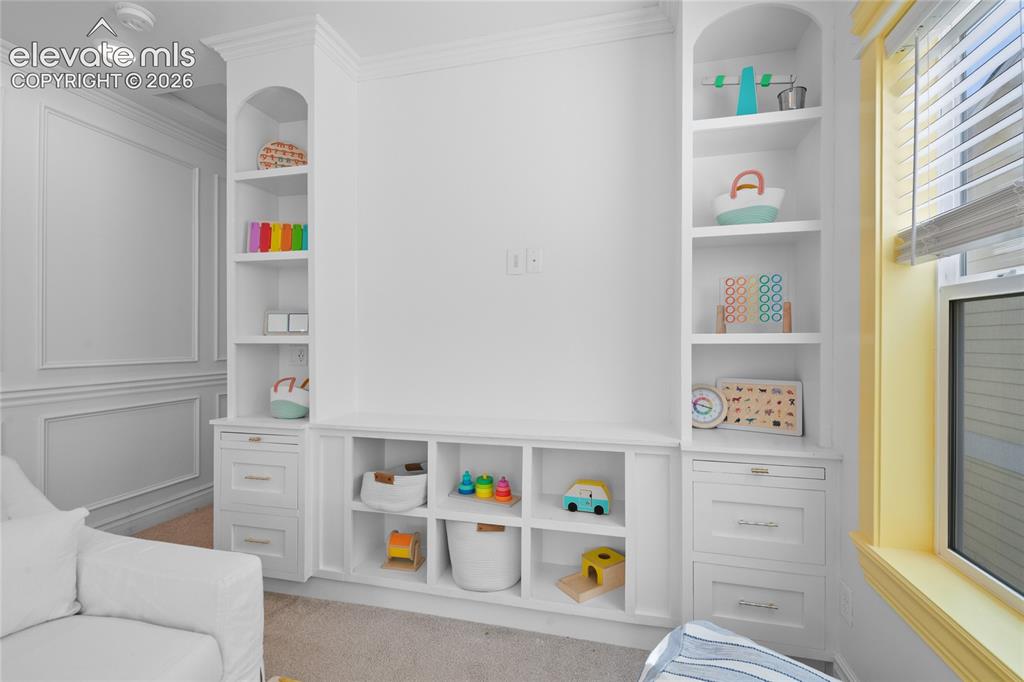 Image 23 of 45: Built in cubbies and drawers for ample storage