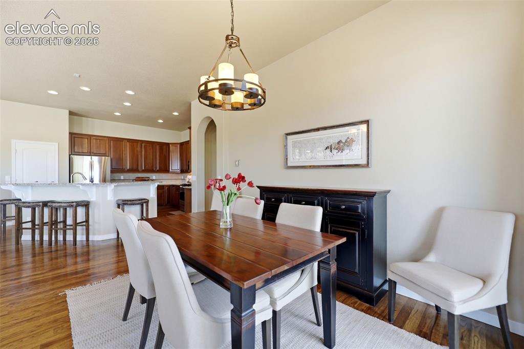 Image 15 of 48: Dining area is also adjacent to the kitchen!