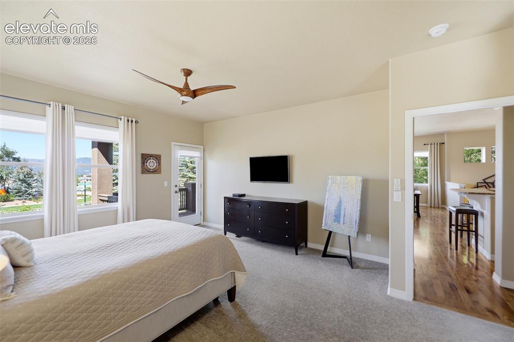 Image 18 of 48: Enjoy the natural light, high ceilings and gorgeous views in the primary be