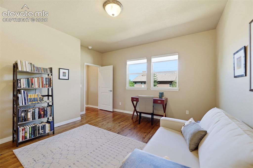 Image 24 of 48: Plenty of space and natural light in the main-level office. 
