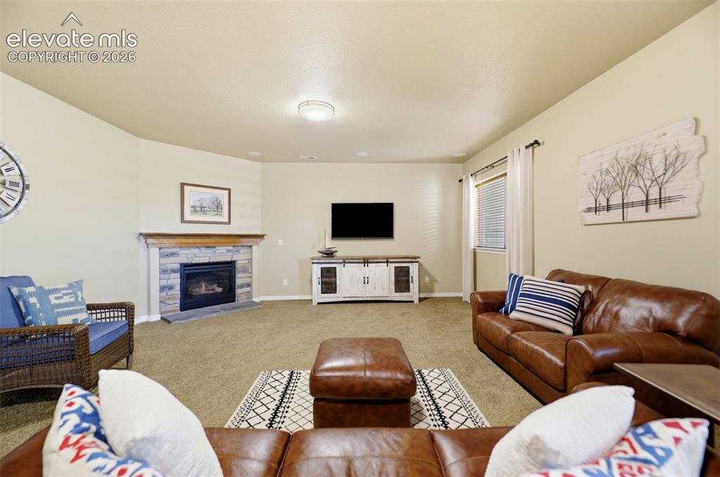 Image 27 of 48: The large family room in the basement is great for movie nights!