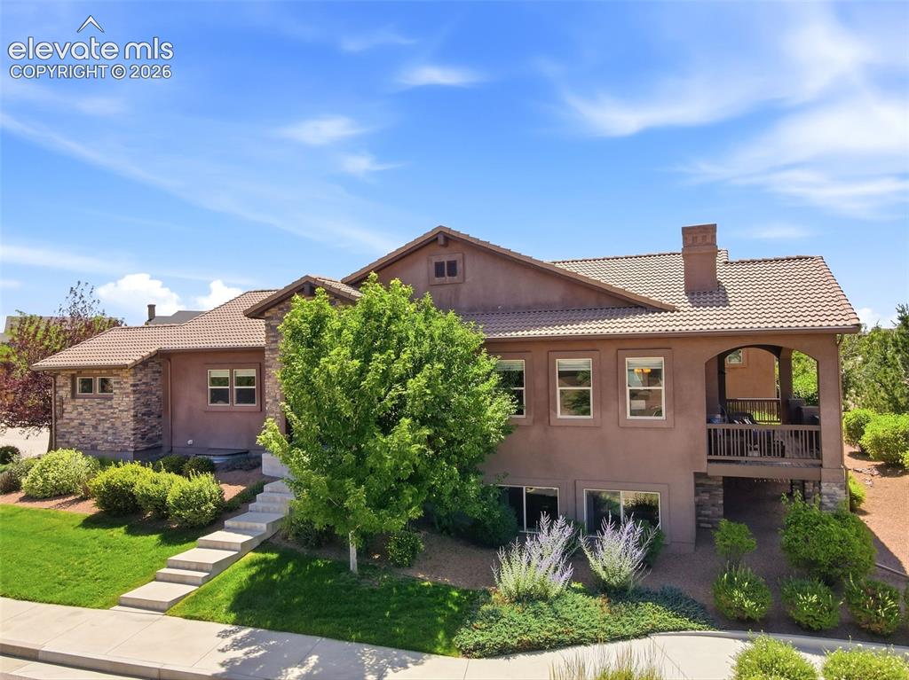Image 4 of 48: Home is fully landscaped and mantained by HOA