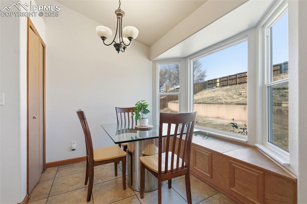 Image 11 of 32: Bay windows and window seat storage